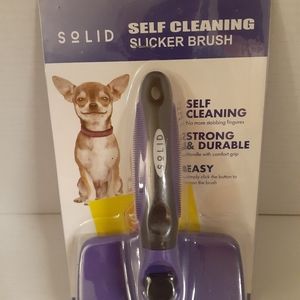 NWT in package Solid Self Cleaning Slicker Pet Brush in Purple for Dogs and Cats